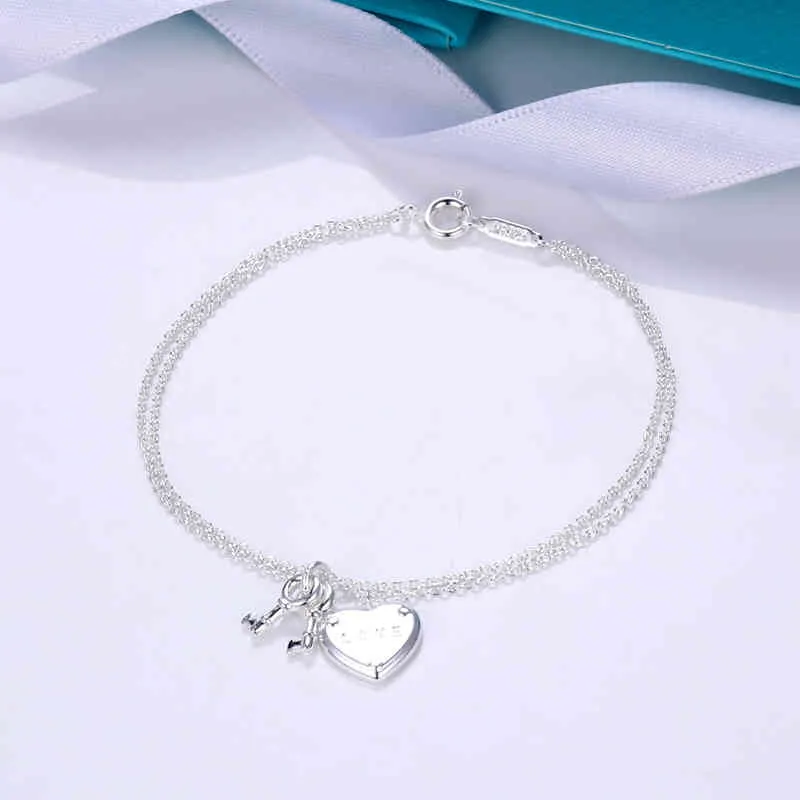 Original TIF Classic Charm Love Key S925 Sterling Silver Double Chain Armband Original Högkvalitativt varumärke Syckel Kvinnors valentinsdaggåva