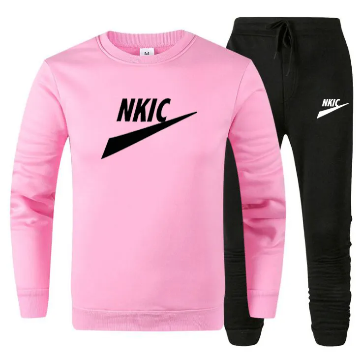 Nike pink tracksuit mens hot sale
