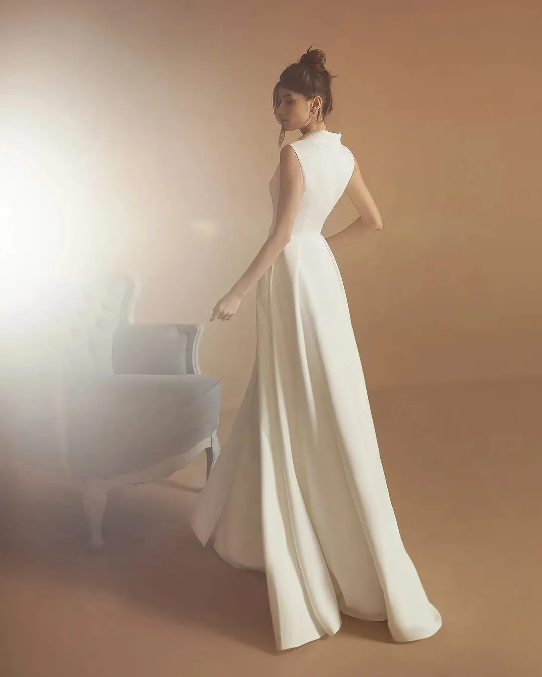 Custom-made Satin wedding dress with slit with High Split, Sleeveless V-Neck Collar, and Floor-Length Hemline - Perfect for a Simple and Elegant Custom-made Satin wedding dress with slit with High Split, Sleeveless V-Neck Collar, and Floor-Length Hemline - Perfect for a Simple and Elegant