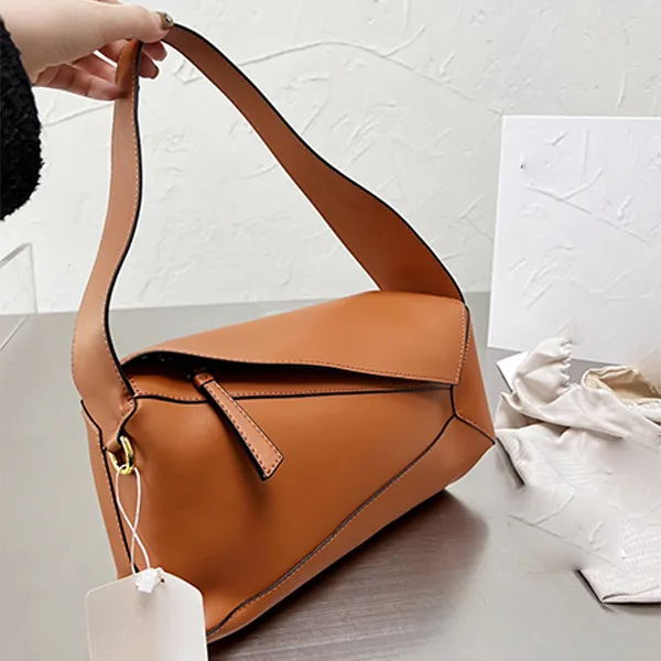 Luxurys Designers shoulder bags Party Shopping Vacation geometric bag leather fashion trend portable Covered Front and Rear Zipper Underarm bag