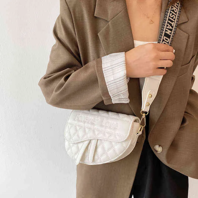 2022 Fanshion Design 여성용 가방 겨드랑이 가방 간단한 단색 재봉 쉘 넓은 어깨 벨트 여성 가방 도매