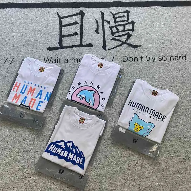 Version korrekt von Human Made x Reo Polar Bear Dolphin Ice Stick Snow Mountain Couple Herren- und Damen-Kurzarm-T-Zylinder-T-Shirt