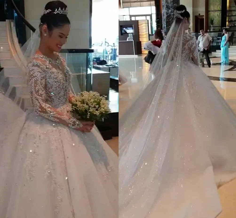 One pcs Luxurious Beadings Appliques Ball Gown Wedding Dresses 2022 Sexy Sheer Long Sleeves Beads Ruched Long Train Bridal Gowns