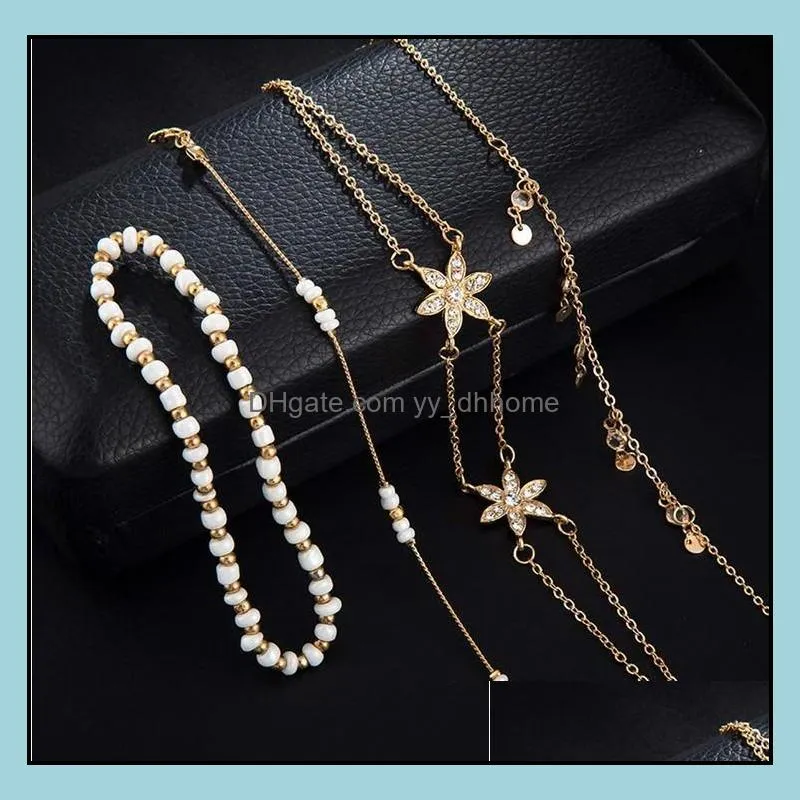 4 Pcs Snow Anklet Bracelets Set for Women Fashion Girls Layered Anklet Bracelets with Tassel Pendant Gold Boho Ankle Necklace Chain