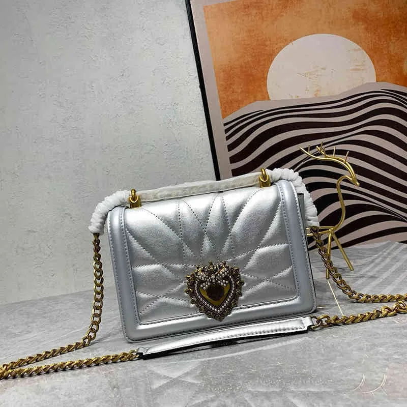 Designer schoudertas 7a hoogwaardige lederen dames ketting mode crossbody tassen byes trend ontwerpers handtassen hou van parel clasp vrouwelijke portemonnees 230523BJ