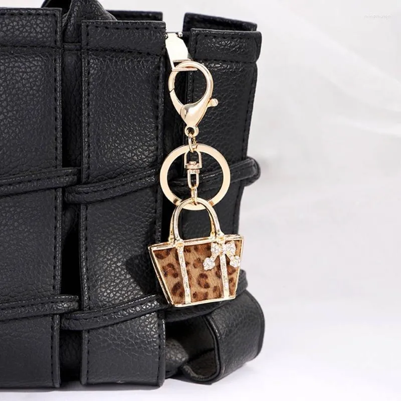 Keychains aprimorou bens decorativos de alumínio de alumínio artesanato de leopardo de modelagem de grãos chaveiros de moda para meninas miri22