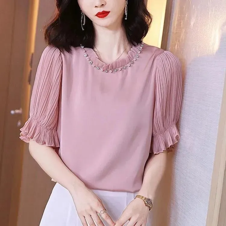 Kvinnors Blusar Chiffon Shirt Sommar 2022 Koreansk version Lös täckmage är tunn temperament Rund halsrosa mjuka bluskvinnor