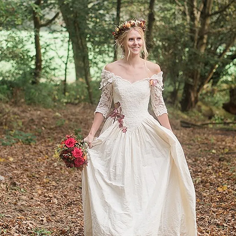 Vintage Ivory Woodland carolyn bessette wedding dress with Lace and Satin, Half Sleeves, Off-Shoulder A-Line Style, and Court Train - 2022 Collection Vintage Ivory Woodland carolyn bessette wedding dress with Lace and Satin, Half Sleeves, Off-Shoulder A-Line Style, and Court Train - 2022 Collection