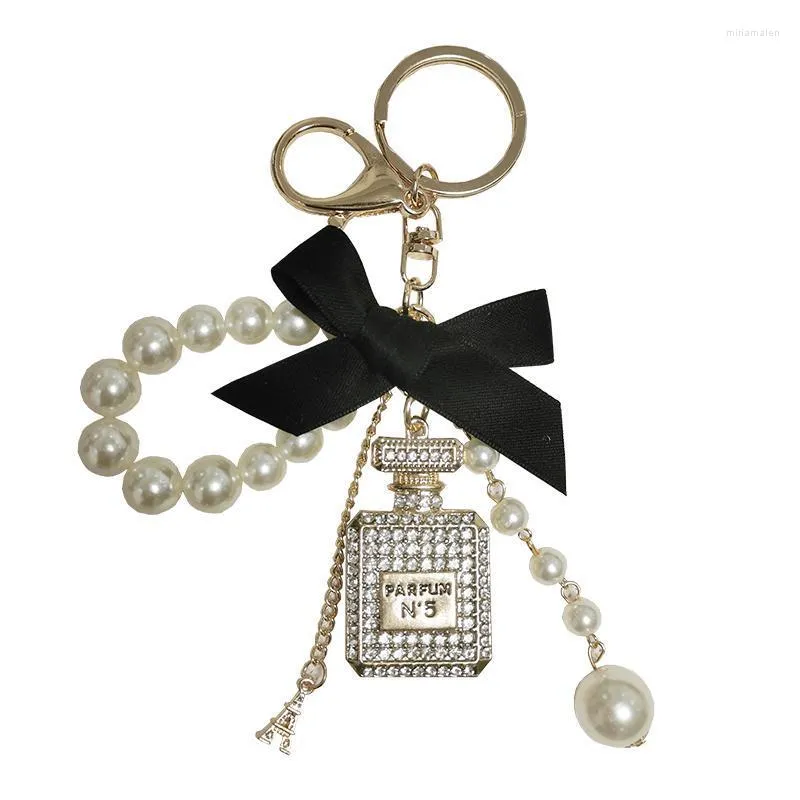 Keychains Pearl Chain Bottle Keychain for Woman Luxury Jewel Bow Car Keyring Bowknot Camellia Pendant Bag Decoration Miri22