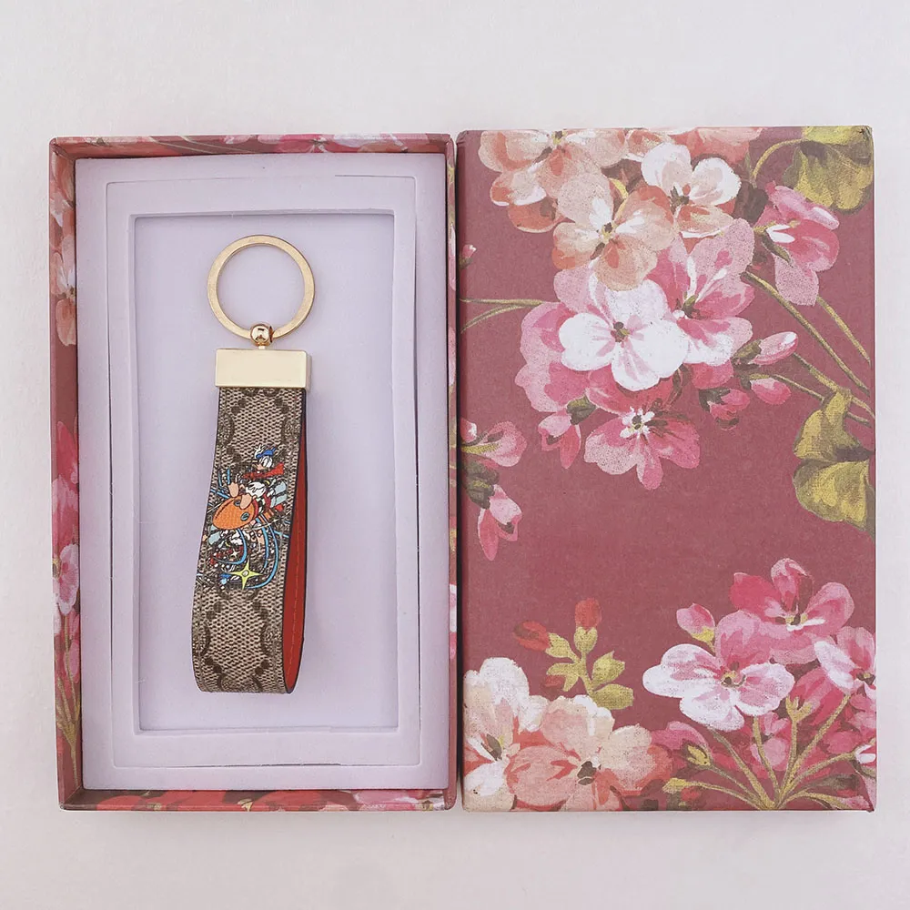 Designer wristlet keychain sale