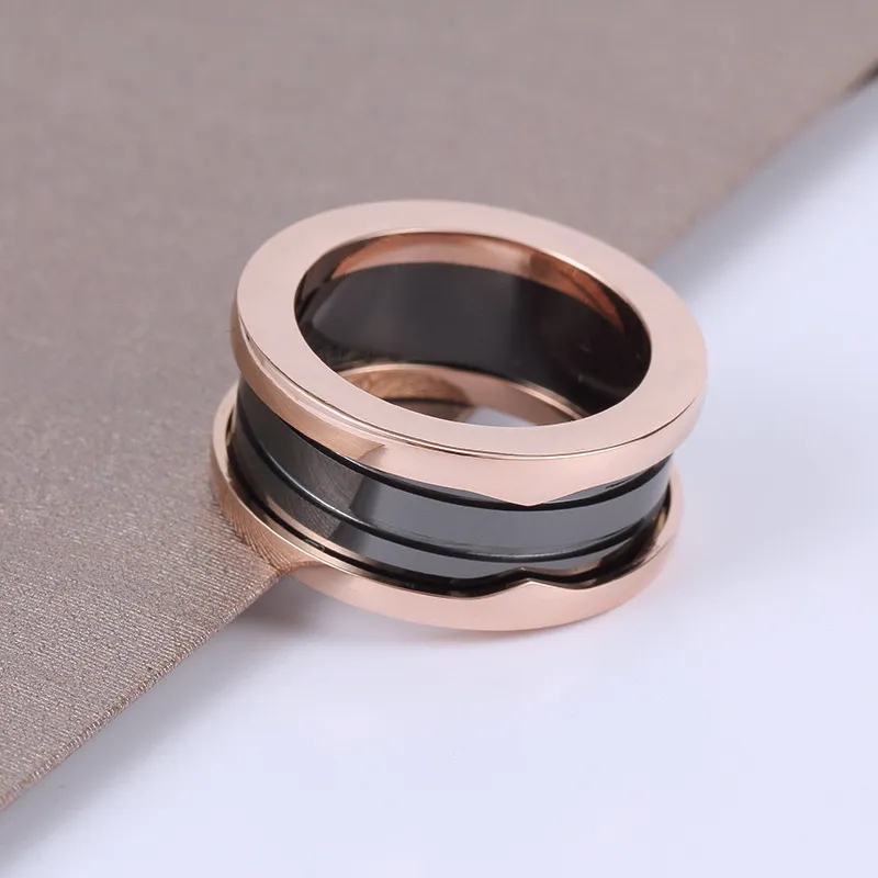 Ceramic Men Women High End Designer Rose Gold and Black Classic Titanium Steel Spring Rings Party Wedding Everyday Jewelry Accessories