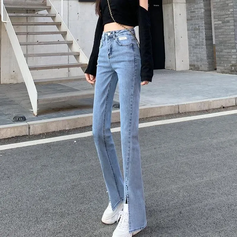 Kvinnors jeans kvinnor svarta flare byxor framsidan slits ben 2022 våren hög midja klocka botten full längd denim kläder