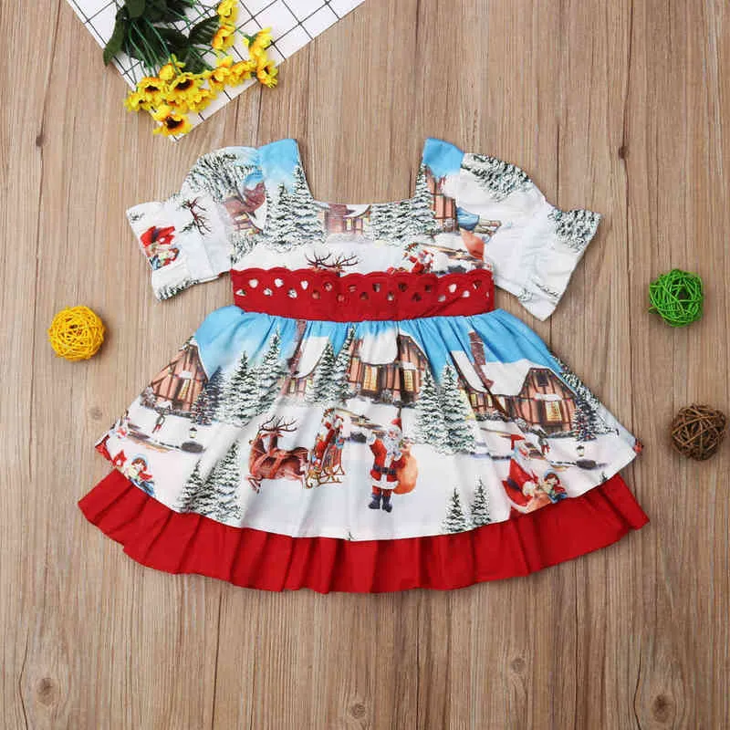 white christmas dresses Santa Smocked Christmas Layette Gown- Baby Girl – Pleats and Stitches main image 1