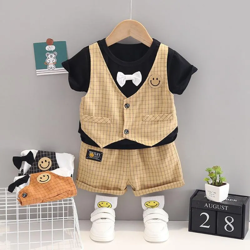 Set di abbigliamento Abiti estivi per neonato Moda coreana O-collo T-shirt scozzesi Top e pantaloncini Abiti firmati per neonati in due pezzi Tute per bambini