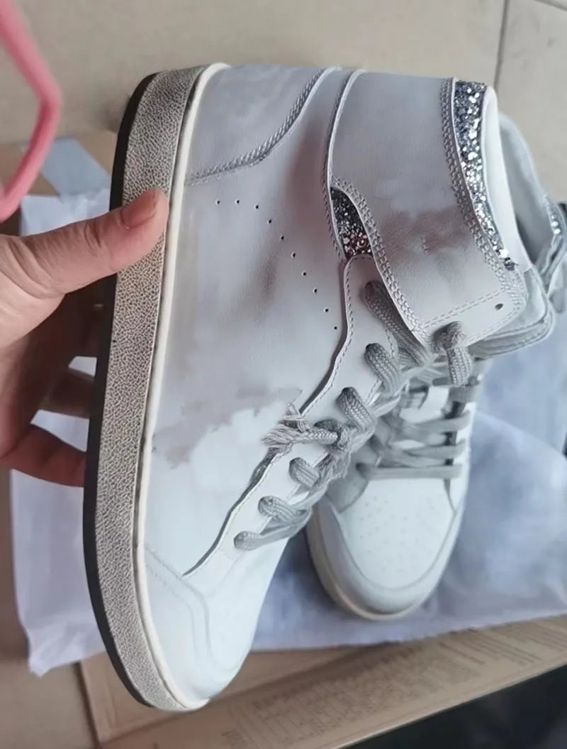 Metallic silver on sale high top sneakers