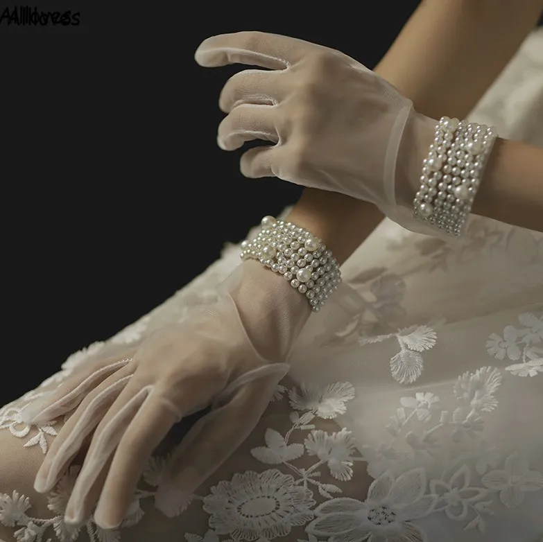 Perles de fantaisie Glants de mariage blancs pour les mari￩es Fingers pleins Voir ￠ travers les femmes en mesh Gants de longueur de poigne