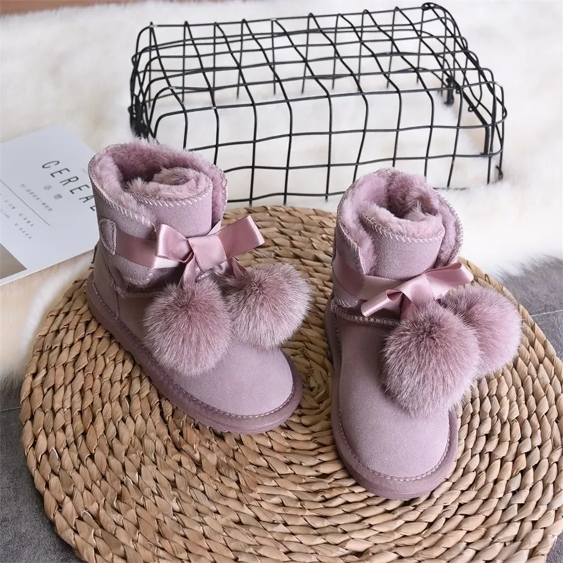 Kids Winter Snow Boots dla dziewcząt luksusowe dzieci platforma skórzana krowa z futrzanymi botami kostek z futrzaną piłką LJ201202