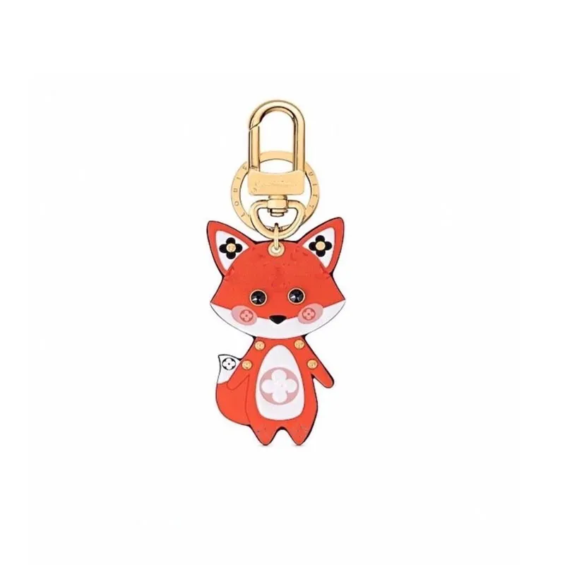 Designer Fox Porte-clés en cuir de haute qualité Porte-clés Mode Sac à main Pendentif Chaîne de voiture Charme Fleur Marron Mini Sac Bibelot Cadeaux Accessoires