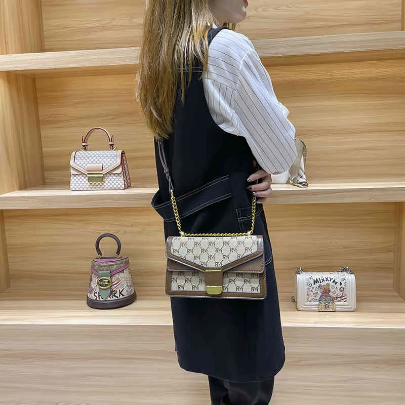Handtassen tas vrouwelijk 2022 Nieuw licht luxe onderarm ontwerp sling een schouder messenger kettingtas live uitzending portemonnee