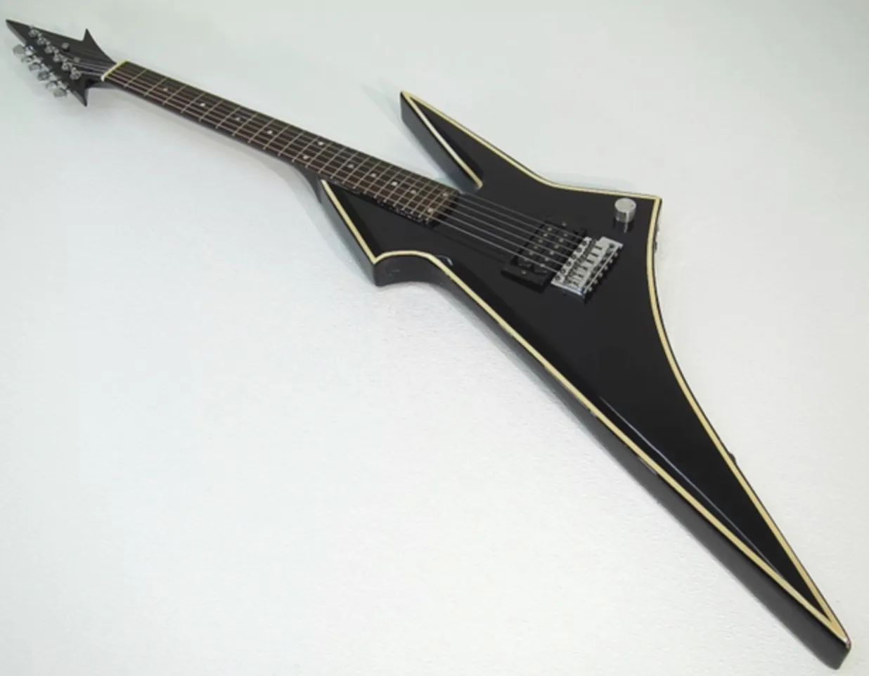 Hondo H1 radical Death Dag Guitar in gloss black with white trim. Customizations accepted