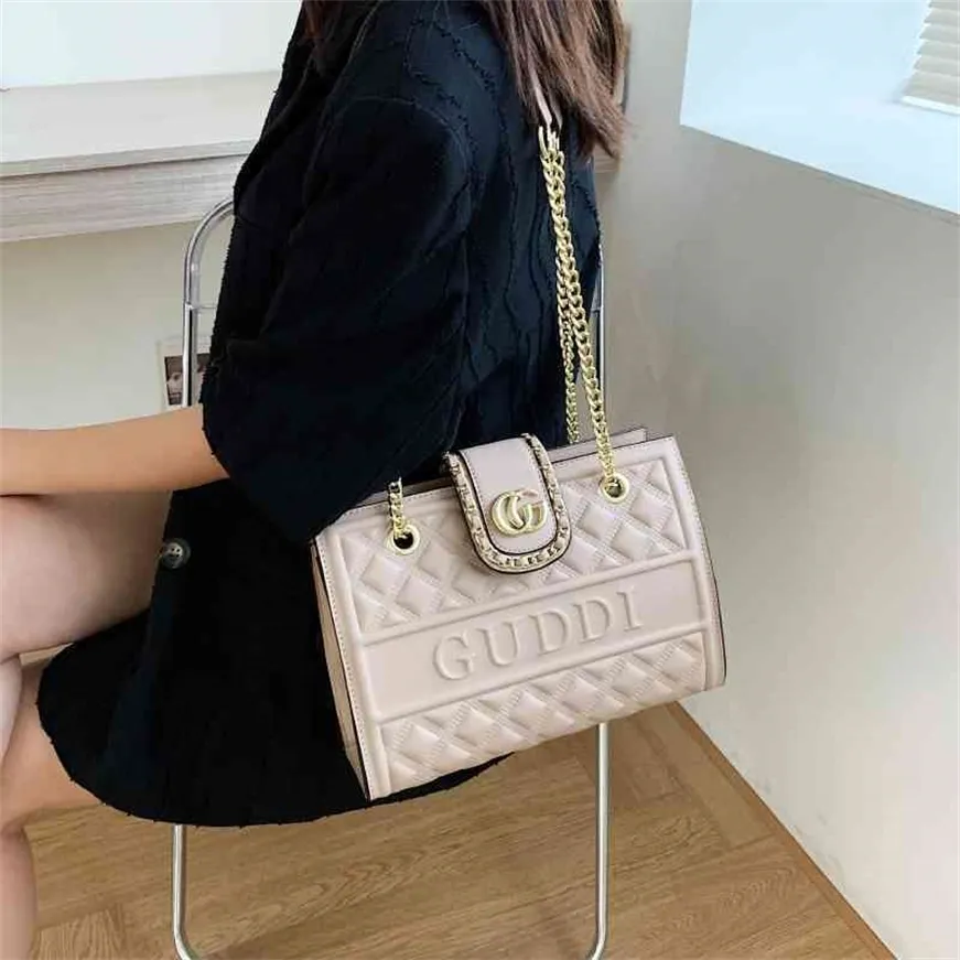 handbag small square bag embossed big rivet solid color Single Shoulder Bag factory store online