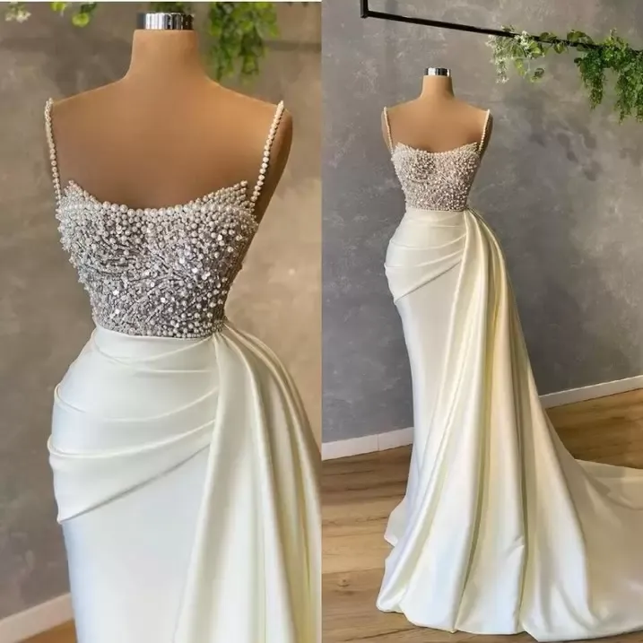 Ivory Wedding 2024 Sukienki syreny suknia ślubna z perłami Kryształy Kryształy Spaghetti Strapy Zamiatek Made Plus Size V Szyjka Szata Mariee vestidos de Estidos