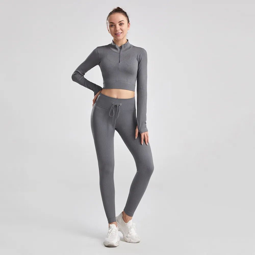 Ajuste de yoga para mujer Cintura alta Hilo para correr fuerte estiramiento color sólido nylon Fitness manga larga y pantalones de bolsillo trajes sin costuras levantamiento de cadera Leggings chándales ss