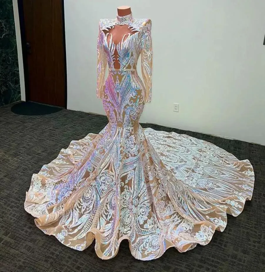 2022 Vestidos de noche de sirena con lentejuelas brillantes Use mangas largas Lentejuelas africanas Apliques Cuello alto Ilusión robe de bal blanche Tren de barrido de cola de pescado Vestidos de baile