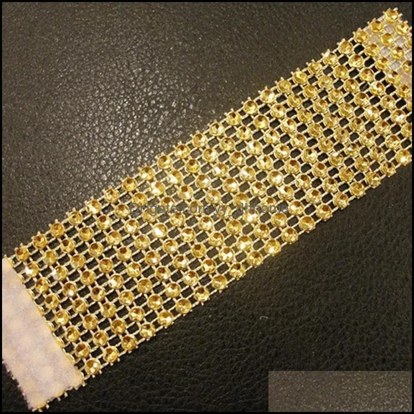 Wholesale- Wholesale 100Pcs/Set Plastic Rhinestone Wrap Golden Color Napkin Ring Napkin Chair Buckle Hotel Wedding Supplies Home