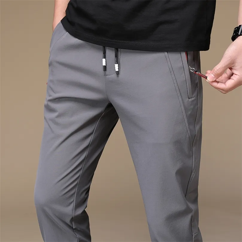 Summer Men Sweatpants Warm Thin Pants Lose Elastic Midj byxor Casual Pants Byxor Big Plus Size 38 201126