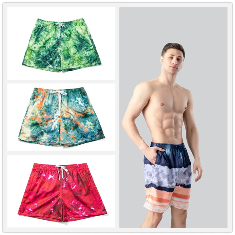 Pantalones cortos de playa de material superior americano, pantalones deportivos de moda para hombre, pantalones cortos azules con estampado de corbata con logo, pantalones de explosión de verano