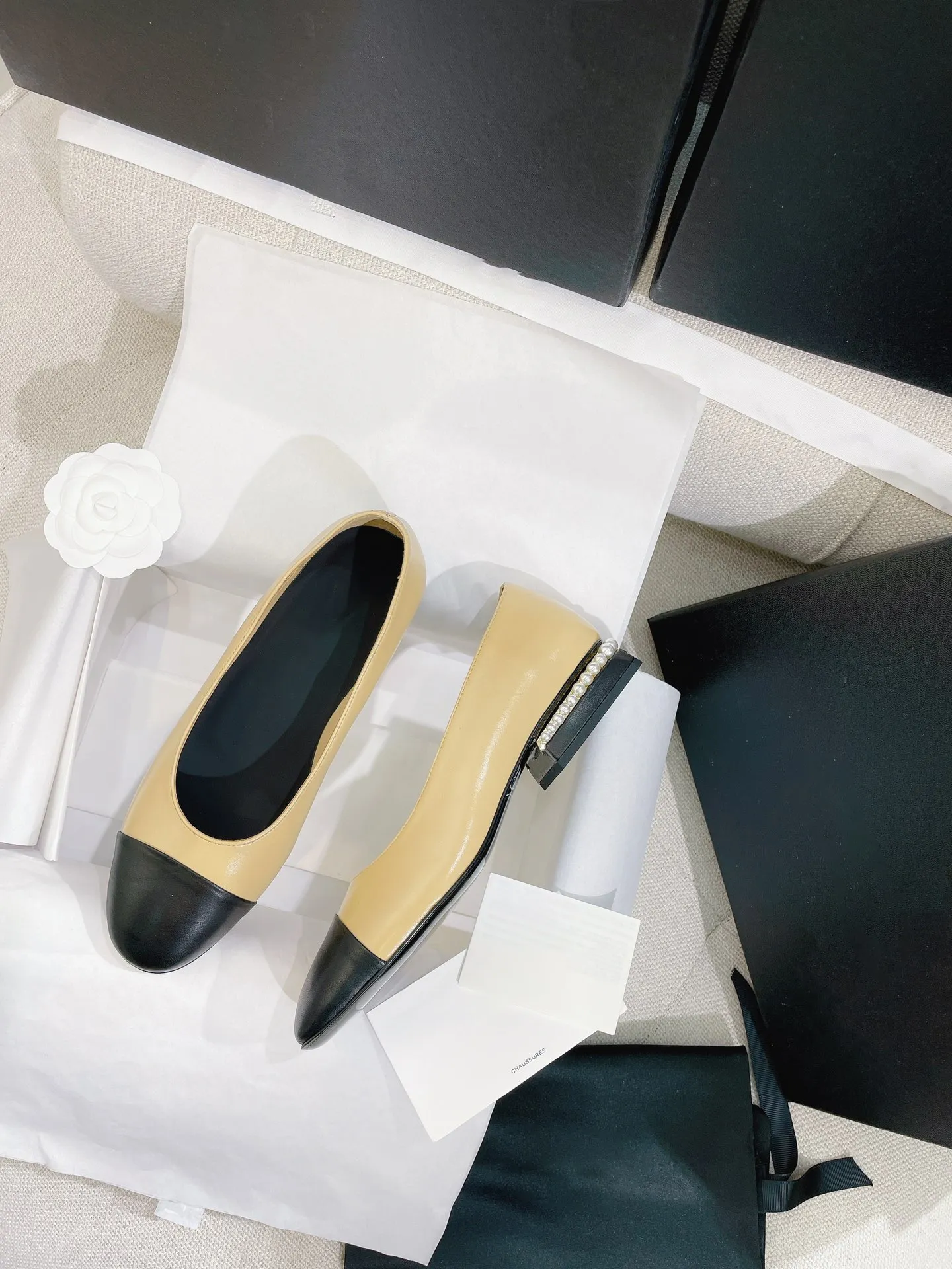 Flats with pearl heel sales