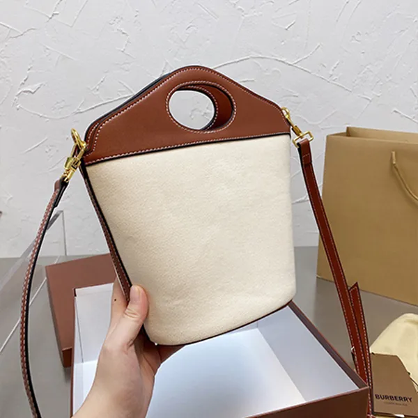 Luxurys Designers Canvas Tote Torbalar Kova Çantası İle Cowhide Sıradan Kadın Çanta Şık Çanta Büyük Kapasite Çantaları Hafif Ağırlık Crossbody Logo