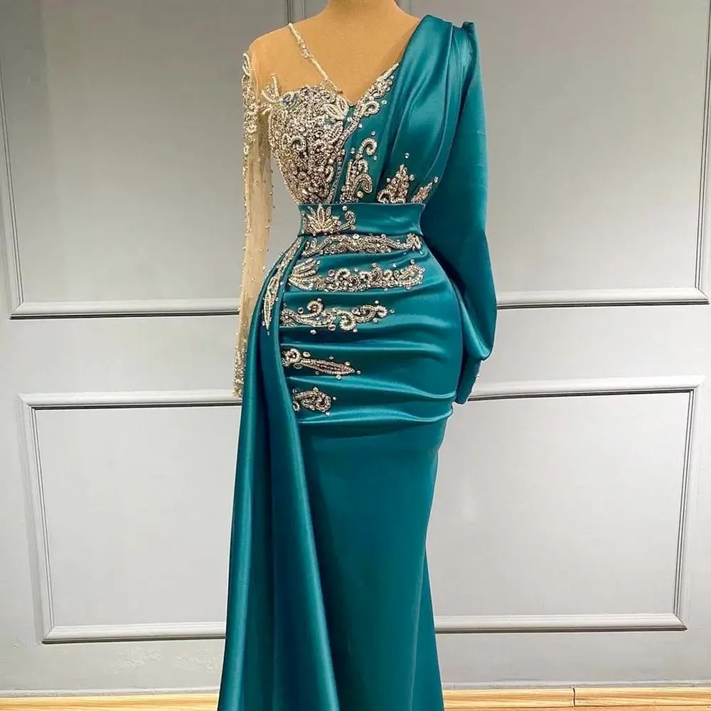 Share more than 144 teal gowns with sleeves super hot