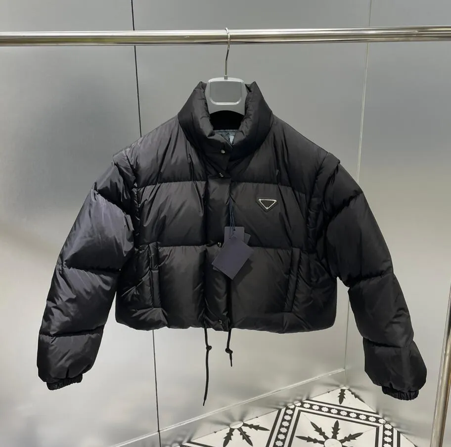 女性用の冬のデザイナージャケットダウンコートバッジスパンコンファッションウォームジャケット調整可能なウエストストリートウェアノースリーブコート4色