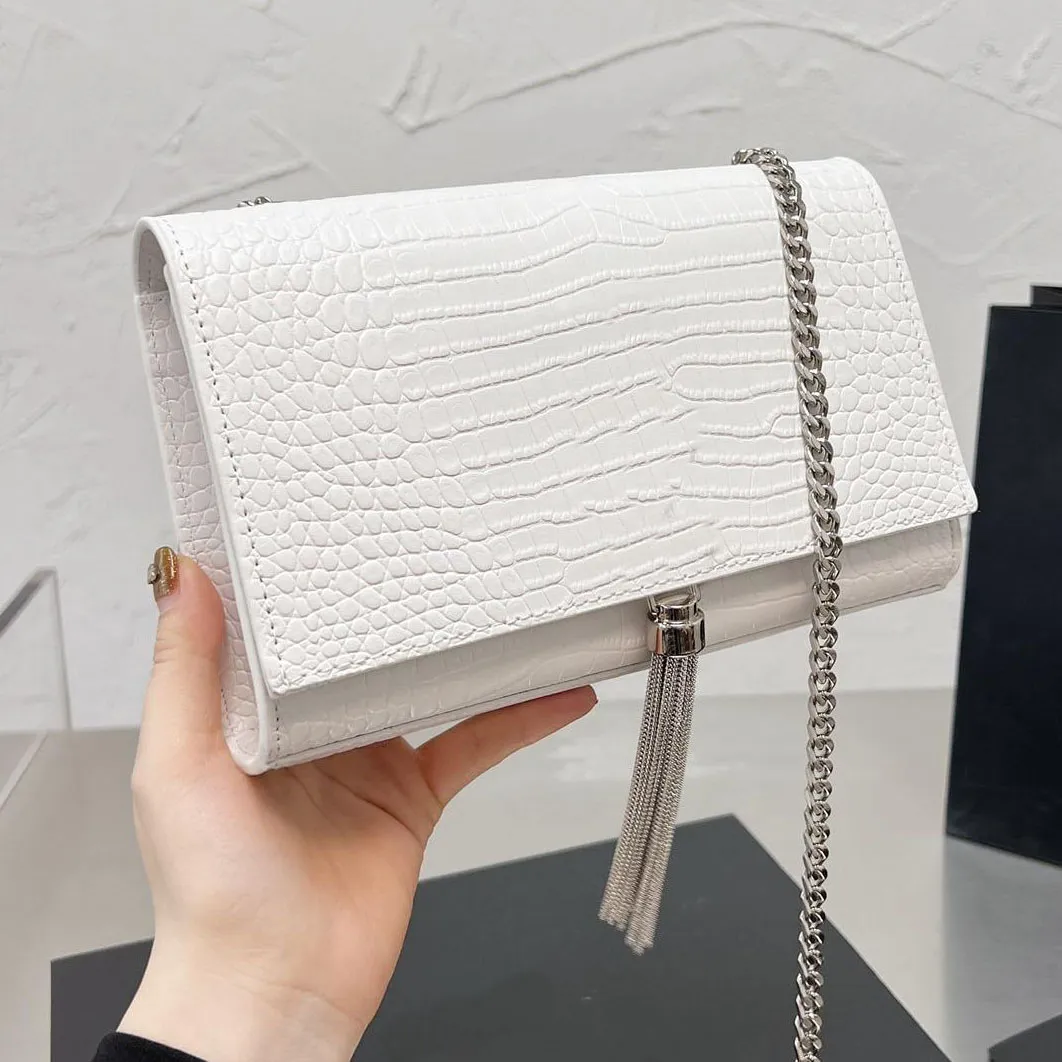 Kate chain wallet with tassel in crocodile embossed leather online