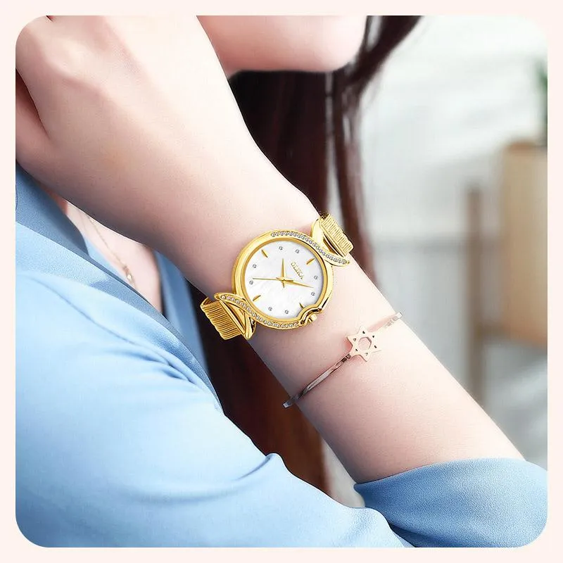 腕時計日本クォーツムーブメントエレガントなスタイルの女性用リストウォッチされた女性ステンレススチールメッシュローズゴールドの防水時計