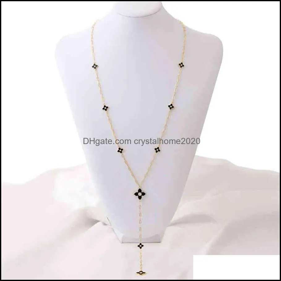 Collares colgantes colgantes joyas oyb moda coreana de cuatro hojas de cuatro hojas cadena larga cadena para mujer suéter de flores joyas253Q DRO