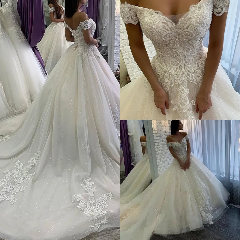 2022 Perline di lusso Abito da ballo Abiti da sposa Cappella Treno Corsetto Bianco avorio Tulle Principessa Abiti da sposa Pizzo Appliqued Off spalla Chiesa Abito da sposa