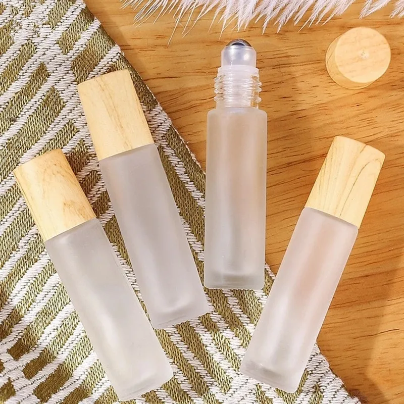 5ml 10ml Roll On Bottle Frosted Clear Glass Roller Bottles with Wood Grain Plastic Cap for Essential Oil Perfume Cosmetic Container