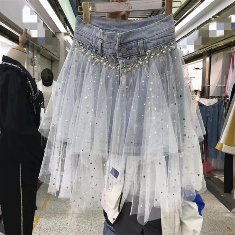 Skirts Irregular Sequins Mesh Stitching Fringed Short Denim Skirt Women Rhinestone Pearl Nail Beading Jeans High Waist Hip SkirtSkirts
