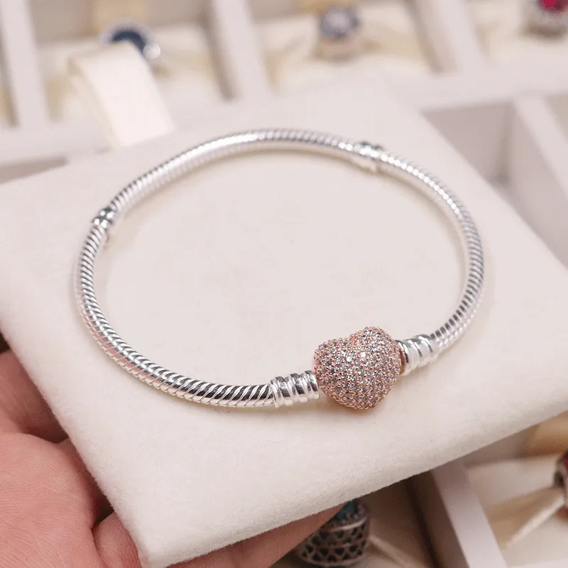 Pandora silver bracelet with rose gold heart clasp on sale