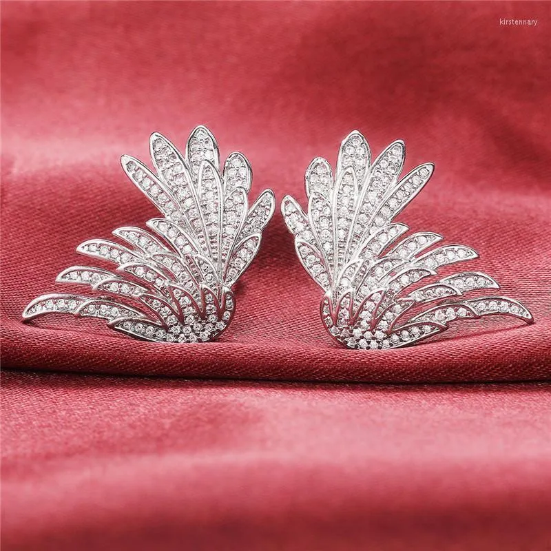 Stud Huitan Preciosos pendientes de boda nupciales Diseño de personalidad En forma de ala con accesorios de mujer CZ para joyería de fiestaStud Kirs22