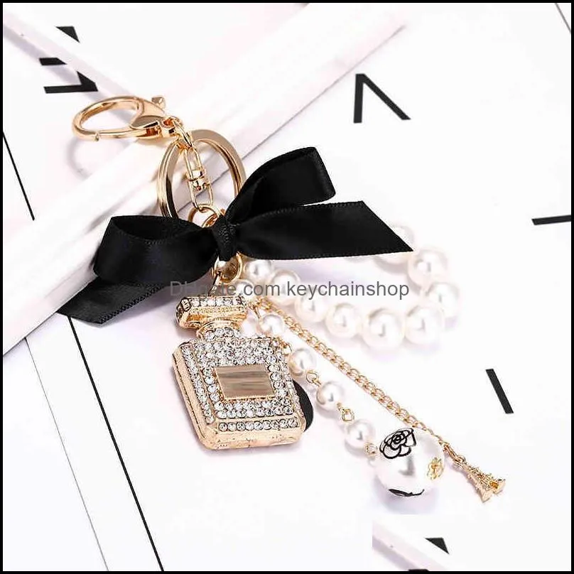 creative handmade diy diamond perfume bottle accessories alloy bow pearl luxury keychain purses charm pendant ys068