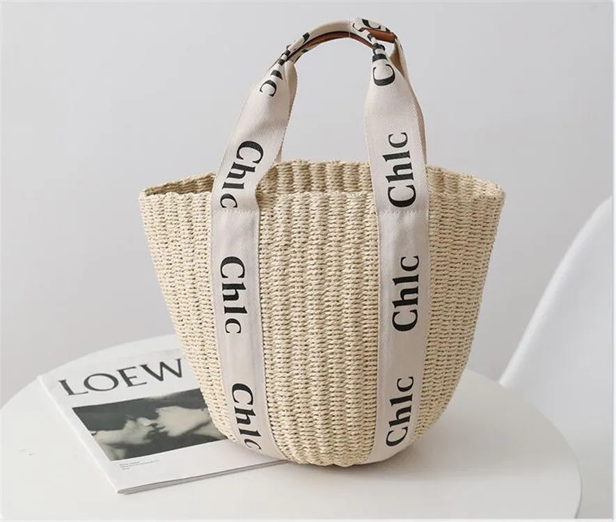 Mulheres Woody Large Garge Straw Basket Bolsa Bolsas Designer Woody Totes Bolsa de ombro Bolsa Cruz Cross Kiss Round Crochet Pesses Qualidade da moda