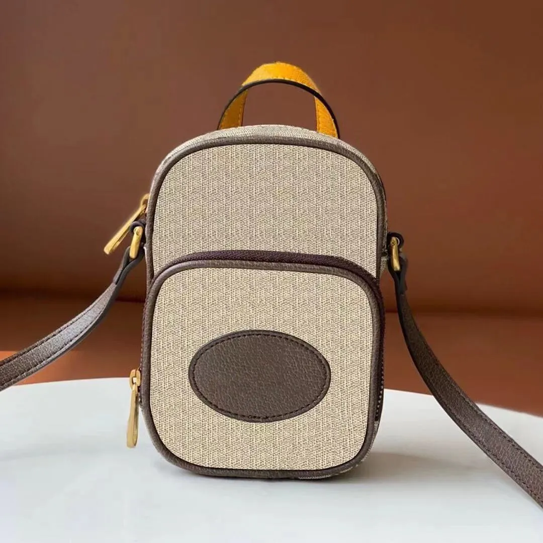 Mini Klare Crossbody In Signature Canvas