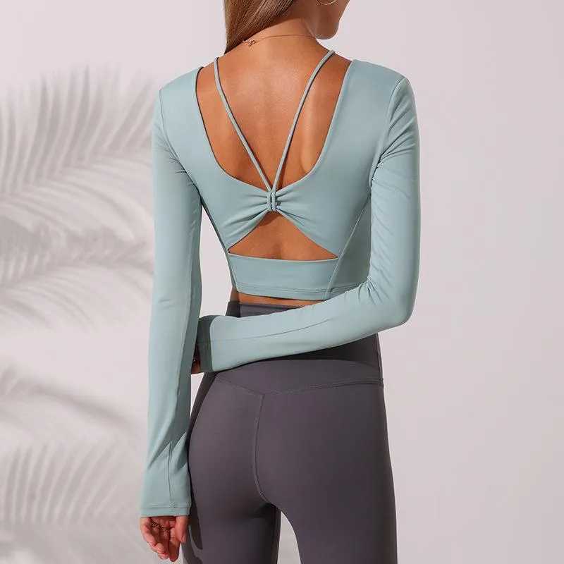 Vêtements de tenue de yoga Femmes Automne à manches longues Tops serrés élastiques extérieurs Running Sexy Beautiful Back Sports T-shirt avec poitrine