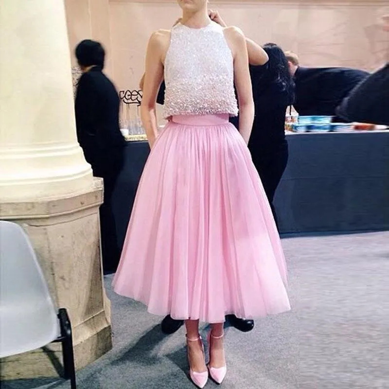 スカート夏のピンクの長さのチュチュフォーマンパーティースカート最高品質のエレガントなチュールミディカスタムメイドの女性衣料品