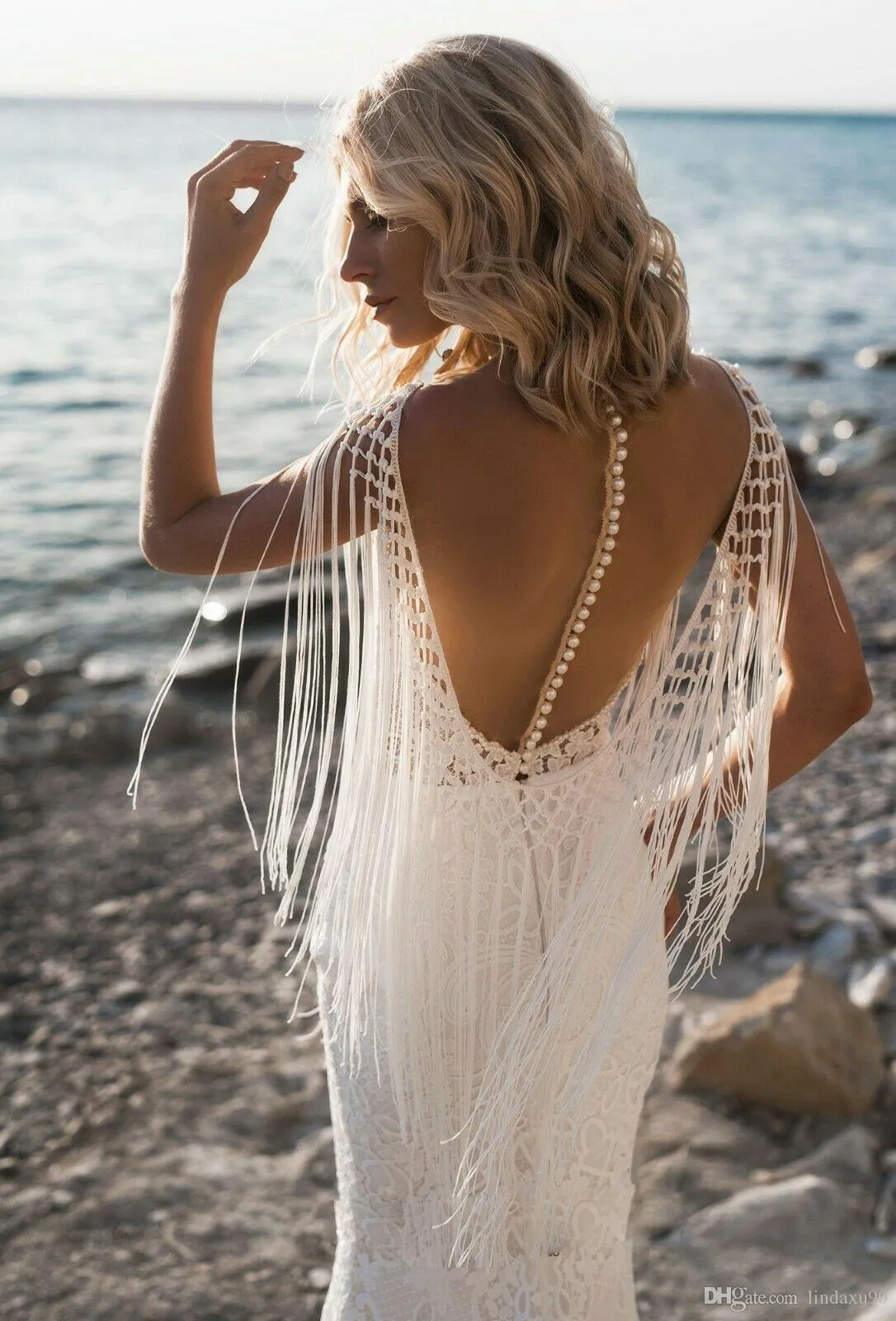 Bohemian Mermaid fringe wedding dress with Fringe, V-Neck, Tassel Detailing, and Appliques Lace - Sleeveless Bridal Gown for Beach Weddings (robe de