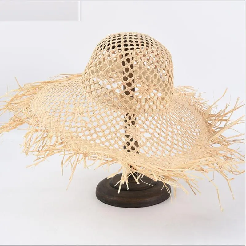 Chapeaux à bord large grand chapeau de paille Summer Hollow out design pliable Raffia
